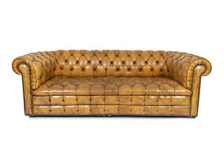 An English Edwardian Tufted Leather Chesterfield Sofa
Height 28 x width 84 x depth 34 inches.