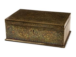 An Anglo-Colonial Style Engraved and Enameled Metal Table Casket
Height 4 1/2 x width 12 1/2 x depth 8 1/2 inches.