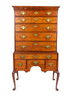 A Queen Anne Style Maple Flat-Top Highboy
Height 71 1/4 x width 40 1/2 x depth 21 inches.