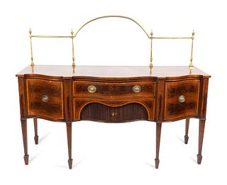 A Federal Inlaid  Inlaid Mahogany Double Serpentine Sideboard with Brass Gallery
Height 36 1/2 x width 72 x depth 26 1/2 inches; overall height with b