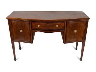 A Federal Style Satinwood and Ebony-Inlaid Mahogany Sideboard
Height 35 x length 53 3/4 x depth 21 1/4 inches.
