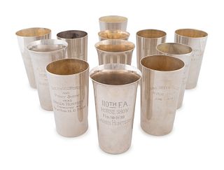 A Collection of Twelve American Silver Mint Julep Trophy Cups
Height of tallest 5 1/4 inches.
