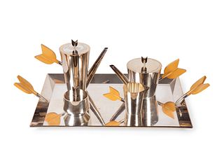 An Italian Modernist Silver Tea Set
Height of coffee pot 7 3/4 inches; length of tray 25 x width 13 1/2 inches.