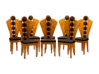 A Set of Eight Art Deco Style Dining Chairs
Height 47 x width 23 x depth 19 inches.