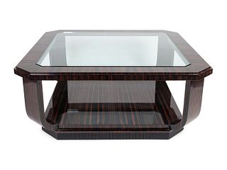 A French Art Deco Style Macassar Two-Tier Coffee Table
Height 24 x 42 inches square.