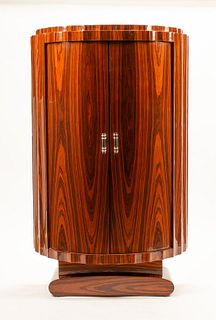 An Art Deco Style Rosewood Cabinet
Height 64 x width 39 1/2 x depth 19 inches.