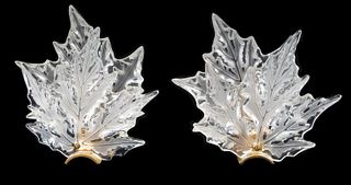 A Pair of Lalique Champs-Elysees Sconces
Height 13 x width 11 x depth 5 inches.