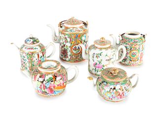 A Collection of Six Chinese Famille Rose Diminutive Teapots
Height of tallest 6 inches.