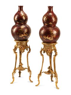 A Pair of Chinese Export Gold and Red Lacquer Vases with Gilt Bronze Stands
Height overall 53 inches.