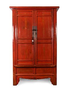 A Chinese Red-Lacquered Cabinet
Height 98 x width 65 x depth 30 inches.