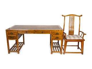 A Chinese Softwood Writing Desk and an Official's Har Armchair
Height 32 1/2 x length 70 1/2 x depth 34 1/2 inches.; height of armchair 50 x width 25 