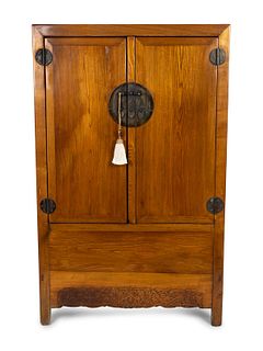 A Chinese Elmwood Cabinet
Height 64 x width 43 x depth 20 1/4 inches.