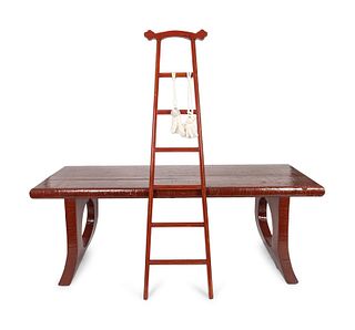 A Chinese Red Lacquer Table and Ladder
Height 31 x length 88 x depth 37 inches.