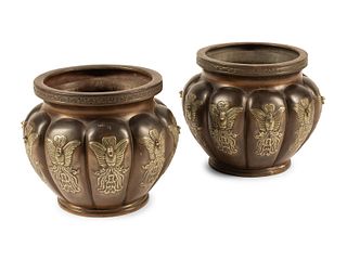 A Pair of Japanese Bronze Jardinieres
Height 11 1/2 x diameter 13 1/2 inches.