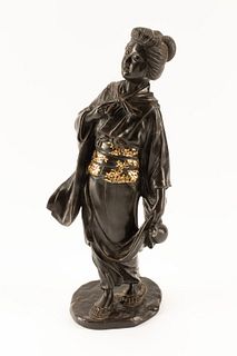 A Japanese Parcel Gilt Bronze Figure of a Lady
Height 15 1/2 inches.
