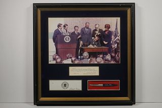 FRAMED PHOTO OF A UNITED STATES ACT OF CONGRESS SIGNED BY NIXON, INCLUDING PEN