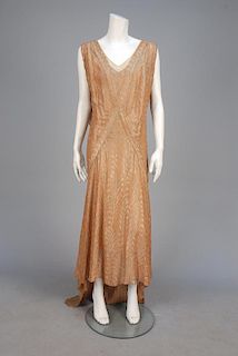 METALLIC BROCADE TRAINED EVENING DRESS, 1920s.