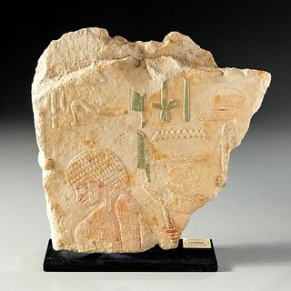 Egyptian painted limestone relief fragment