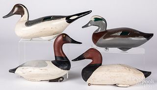Four carved and painted duck decoys.