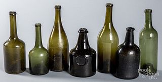 Six antique glass wine bottles, etc.