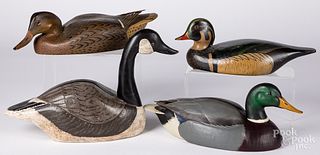 Three carved and painted duck decoys and goose