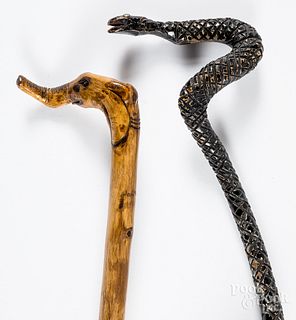 Two folk art carved canes