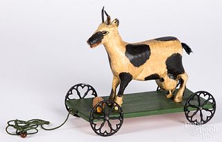 Walter Gottshall carved cow pull toy