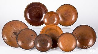 Nine redware plates and chargers, 19th c.