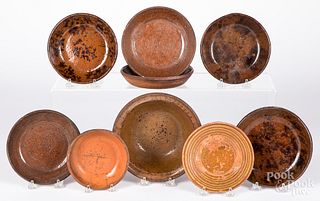 Nine assorted redware bowls, 19th c.