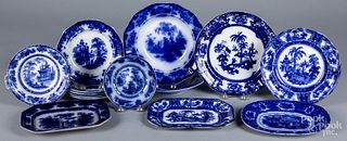 Fourteen flow blue porcelain plates and platters