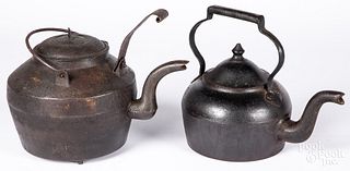 Two antique iron kettles
