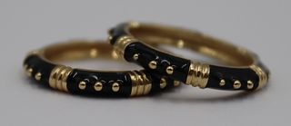 JEWELRY. Pair of 14kt Gold and Black Enamel Rings.