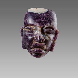 A Pre Columbian Style Stone Mask.