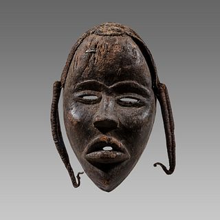 African Ivory Coast Wooden Mask With False hair.