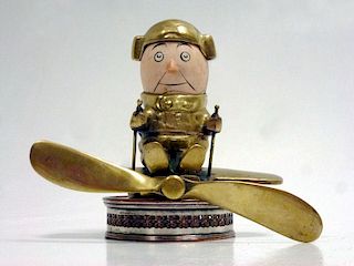 A scarce accessory mascot of bronze construction, as produced c1917 - 1918, featuring a spring loade