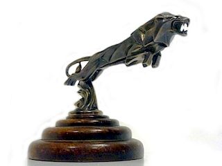 Signed by the sculptor, beautiful patinated natural bronze finish, pure Art Deco styling, the larger