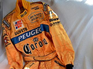 Race used suit from the ever popular Formula One commentator and pundit. As used during the 1996 sea