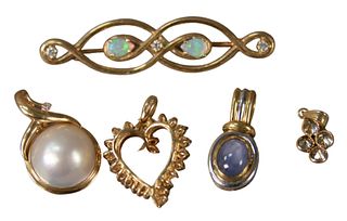 Five Piece 14 Karat Gold Lot, to include heart pendant with diamonds; pendant with champagne diamonds; pearl pendant; sapphire pendant; total weight 1