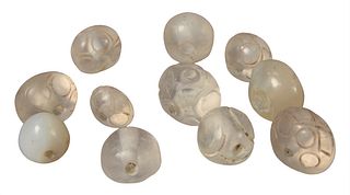 Collection of Eleven Ancient Carved Rock Crystal Seals, 1/2 - 1 inch.