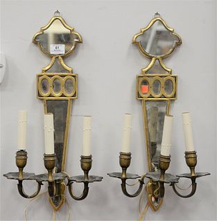 Pair of French Gilt Bronze and Mirrored Three Light Wall Sconces, height 22 inches, width 11 inches.