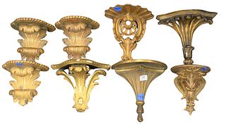 Group of Eight Gilt Bracket Shelves, a few with loss and gilt loss, plaster and resin, largest height 11 1/2 inches, width 10 inches, depth 6 inches.