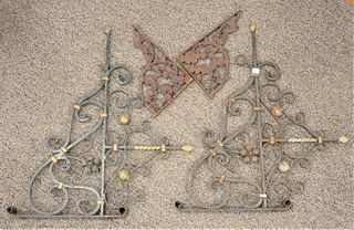 Pair of Wrought Iron Brackets, height 39 inches, length 28 inches.