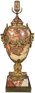 French Rouge Marble Top Lamp, having gilt bronze mounts and Bacchus mask form handles, overall height 23 inches.