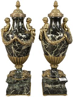 Pair of Green Marble and Bronze Mounted Urns, having mounted mermaid form handles and decorated with shell form mounts on the base, height 19 1/2 inch