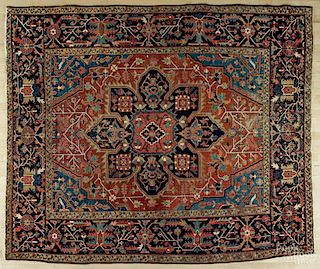 Heriz carpet, ca. 1920, 7'5'' x 8'9''.