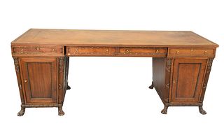 English Regency Style Mahogany Partners Desk, having leather top, sarcophagus form with doors and drawers, set on paw feet, height 32 inches, top 30" 