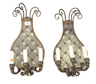Pair of Bronze, Crystal, and Mirror Back Three Light Wall Sconces, height 19 inches, width 8 1/2 inches.