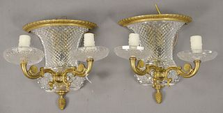 Pair of Empire Gilt Bronze and Cut Glass Urn Form Two Light Wall Sconces, having scrolling arms, height 10 1/2 inches, width 9 1/4 inches.