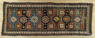 Kurdish Kazak long rug, ca. 1920, 11' x 4'2''.