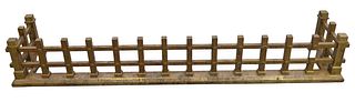 Brass Arts and Crafts Fire Fender, height 9 1/4 inches, width 60 inches.